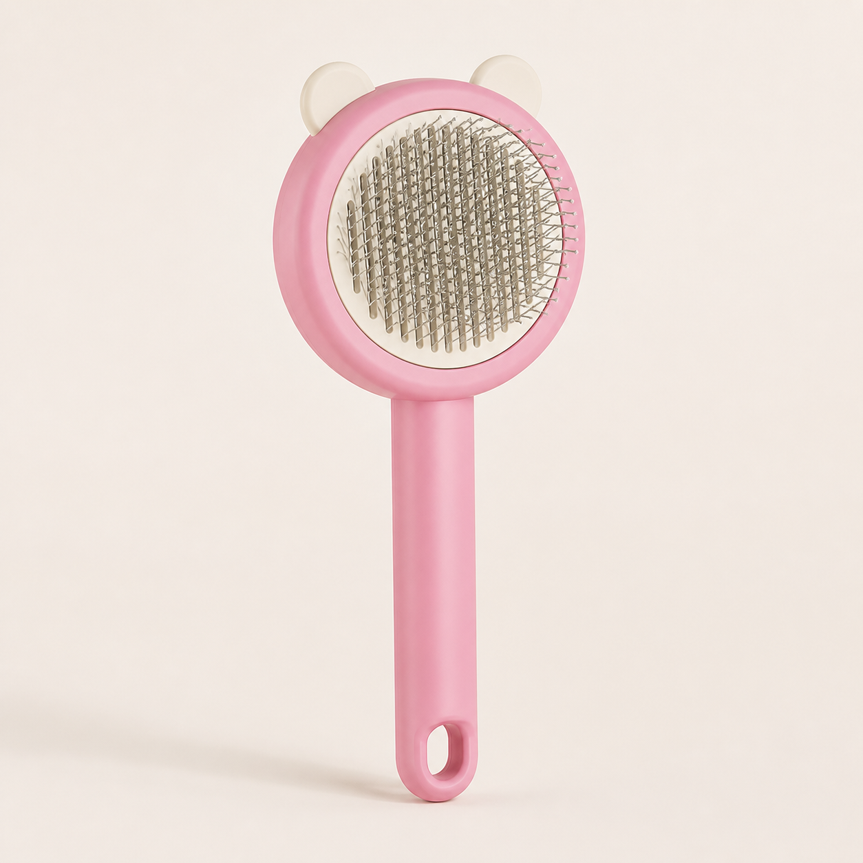 Pink bear-shaped self-cleaning pet grooming pin brush